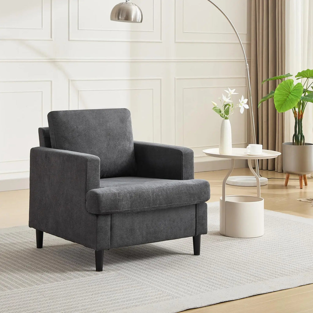 Jade Linen Accent Chair in dark gray linen upholstery in a modern living room
